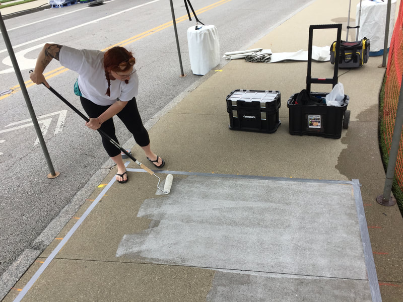 Chalk artists Sheryl Lazenby and Jennifer Russell at the Columbus Arts Festival - recreating an Alice Schille watercolor for the Columbus Museum of Art.